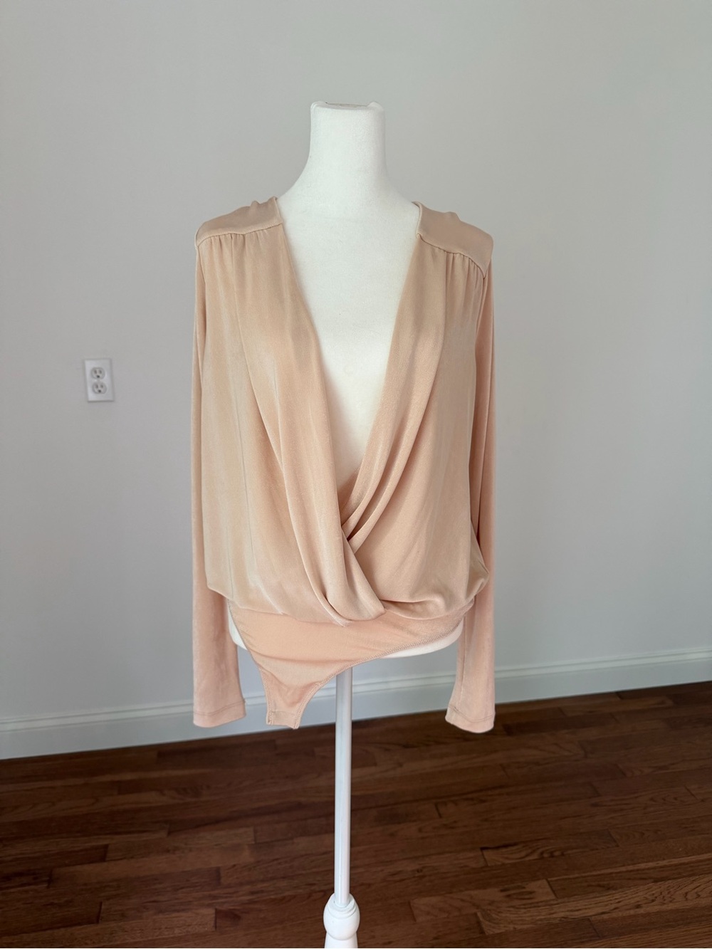 Free People Draped Crossover Long Sleeve Bodysuit in Blush Nude